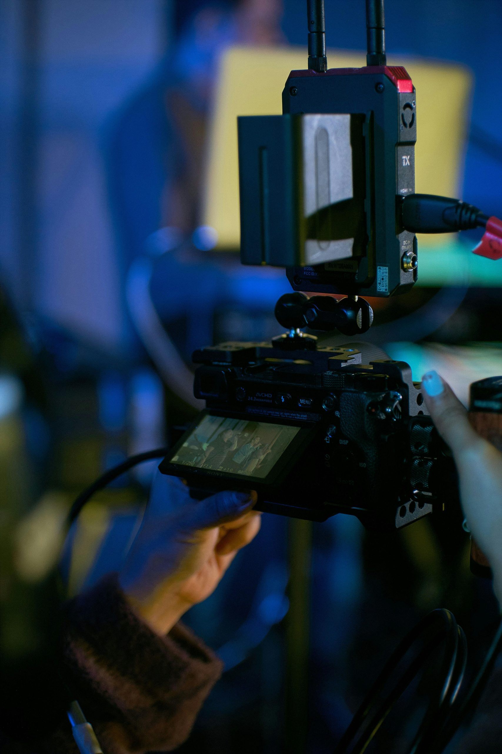 Close-up of video camera setup during a professional video shoot indoors.